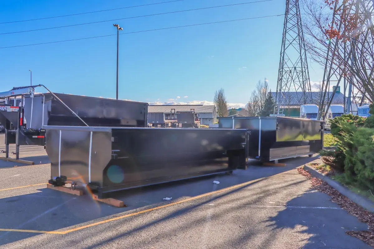 Roll-off dumpster ready for waste disposal at job site for 3 Yard Dumpster Rental in Salem